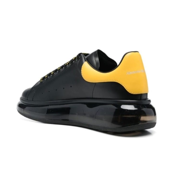 Alexander McQueen Zapatillas de cuero para hombre / Negro Amarillo