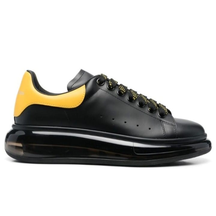 Alexander McQueen Zapatillas de cuero para hombre / Negro Amarillo